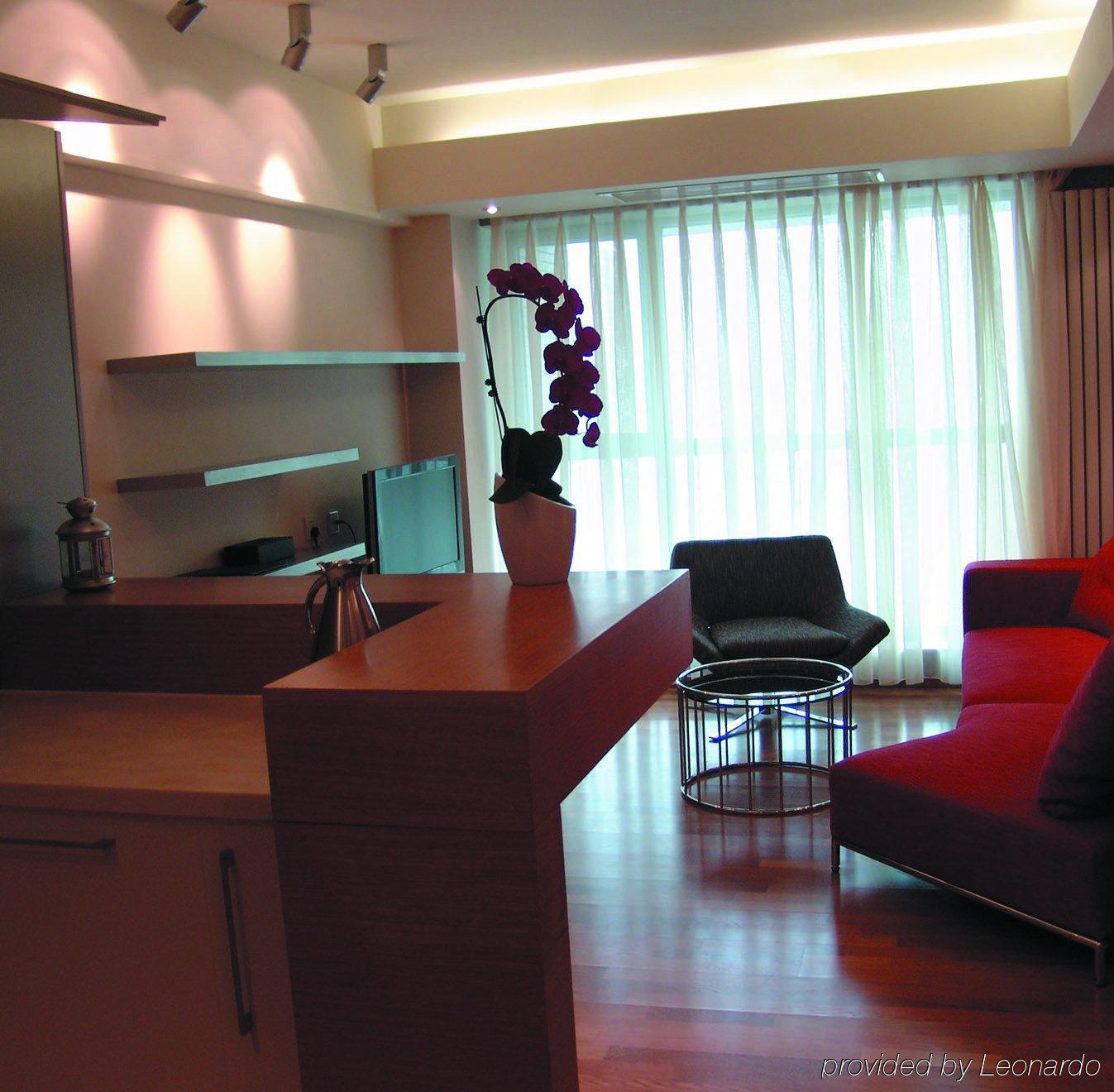Seasons Park Apart Hotel Пекин Стая снимка